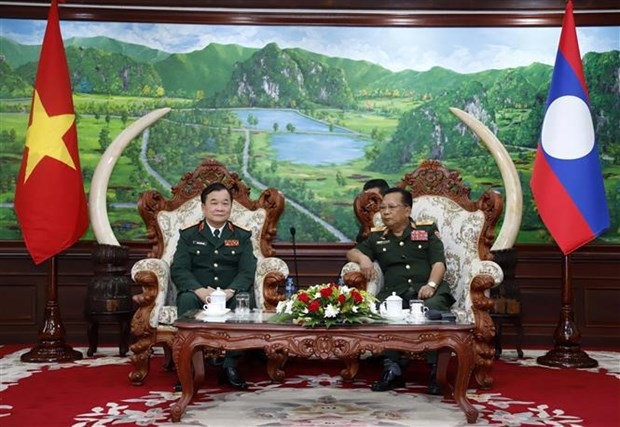 Vietnam, Laos enhance defence links